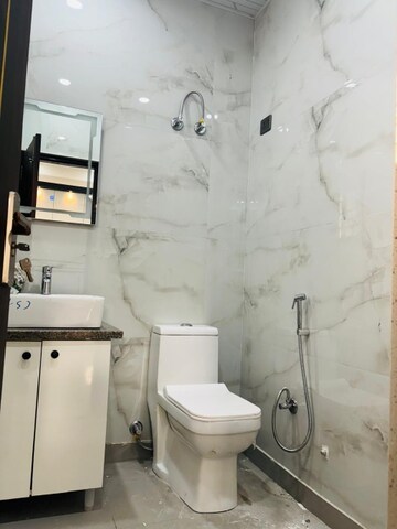 Bathroom in 3 BHK Builder Floor at Kanha Apartments Indirapuram, Shakti Khand 2 – for Sale