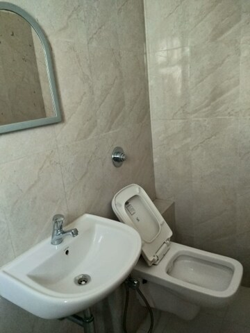 Bathroom in 1 BHK Apartment at Raunak Bliss, Ghodbunder Road – for Rent