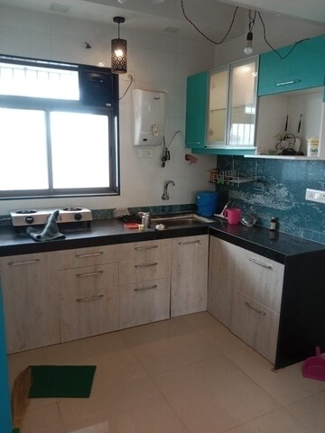 Kitchen in 1 BHK Apartment at Puranik Aarambh, Ghodbunder Road – for Rent