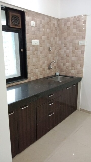 Kitchen in 1 BHK Apartment at Shri Siddhivinayak CHS Haware, Haware City – for Rent