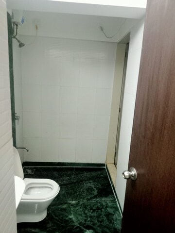 Bathroom in 1 BHK Apartment at Vihang Valley Phase 3, Kasarvadavali – for Rent