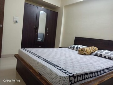 Bedroom in 2 BHK Apartment at Raunak Unnathi Greens, Kasarvadavali – for Rent