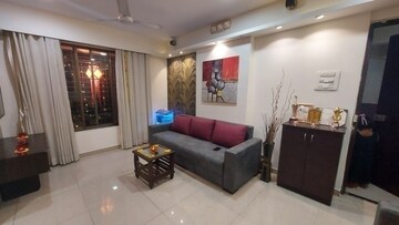 Living Room in 2 BHK Apartment at Raunak Unnathi Greens, Kasarvadavali – for Rent