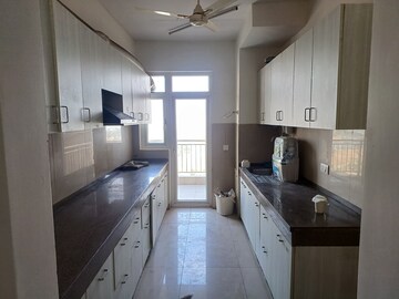 Kitchen in 3.5 BHK Apartment at Emaar Palm Gardens, Sector 83 – for Rent