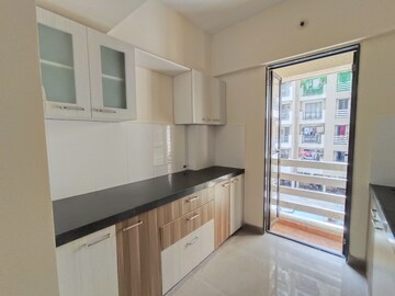 Kitchen in 2 BHK Apartment at Ekta Brooklyn Park, Virar West – for Sale