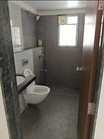 Bathroom in 1 BHK Apartment at Riddhi Enclave Co-op Housing Society Ltd, Viman Nagar – for Rent