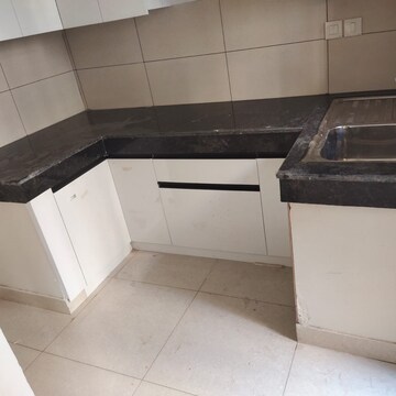 Kitchen in 2 BHK Apartment at Tata Eureka Park, Sector 150 – for Rent