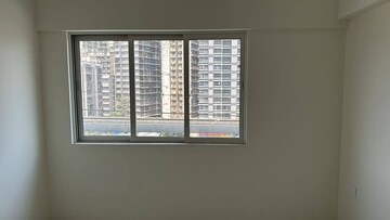Room in 2 BHK Apartment at Omkar Signet, Malad East – for Rent