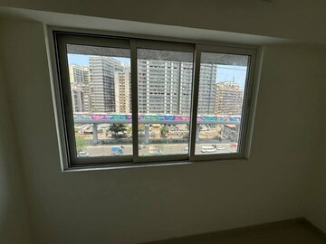 Room in 2 BHK Apartment at Omkar Signet, Malad East – for Rent