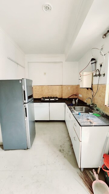 Kitchen in 2 BHK Apartment at Amrapali Pan Oasis, Sector 70 – for Rent