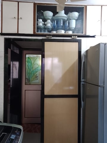 Kitchen in 2 BHK Apartment at Gokuldham Complex, Goregaon East – for Rent