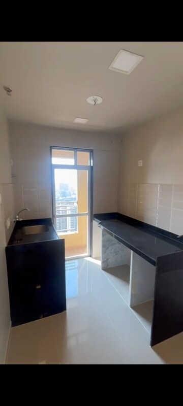 Kitchen in 1 BHK Apartment at JP North Aviva, Mira Road – for Sale