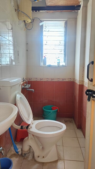 Bathroom in 1 BHK Apartment at Karan Rhea, Wadegaon – for Rent