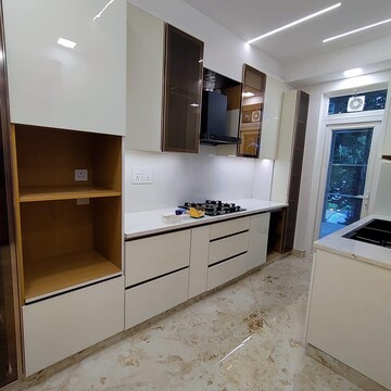 Kitchen in 4 BHK Apartment at DLF The Aralias, Sector 42 – for Sale
