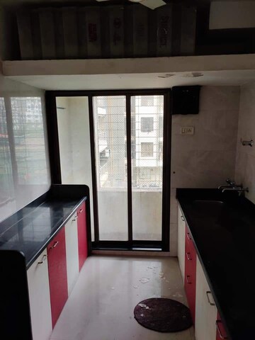 Kitchen in 1 BHK Apartment at PNK Winstone, Mira Road – for Rent