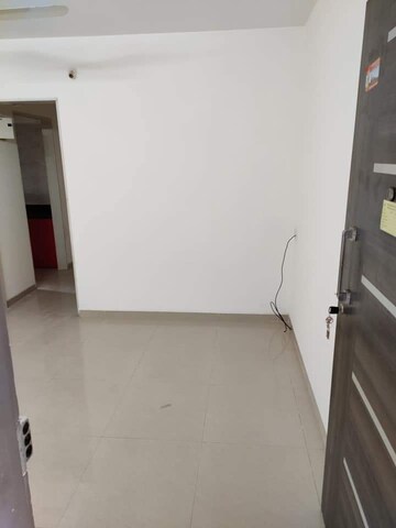Living Room in 1 BHK Apartment at PNK Winstone, Mira Road – for Rent
