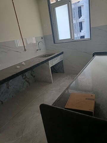 Kitchen in 2 BHK Apartment at Sheth Vasant Oasis, Andheri East – for Rent