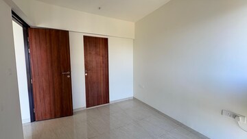 Living Room in 2 BHK Apartment at Lodha Quality Home Tower 5, Majiwada – for Rent