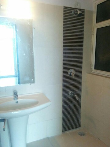 Bathroom in 3.5 BHK Apartment at Unnati Fortune The Aranya, Sector 119 – for Rent