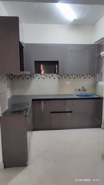 Kitchen in 2 BHK Apartment at Signature Orchard Avenue 2, Sector 93 – for Rent