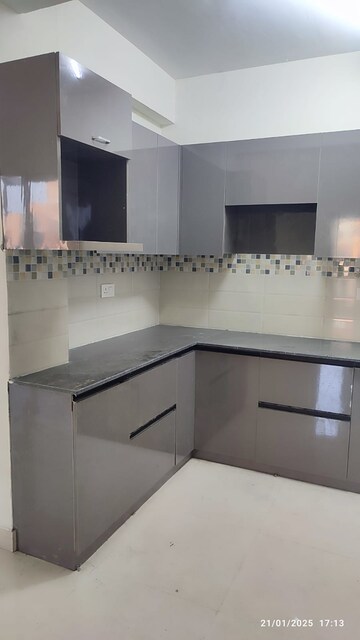 Kitchen in 2 BHK Apartment at Signature Orchard Avenue 2, Sector 93 – for Rent