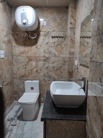 Bathroom in 3 BHK Builder Floor at Paschim Vihar – for Rent
