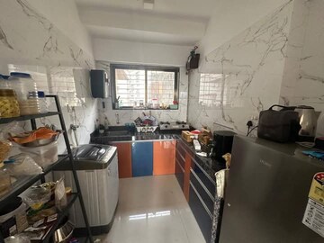 Kitchen in 1 BHK Apartment at Jeenaam Adiraj Ascent , Nalasopara East – for Sale