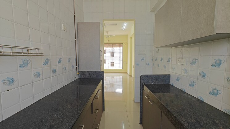 Kitchen, nisar-rajal-veer-abhimanyu-chs 2 Bedroom 566 Sq.Ft. Apartment In Babhai Naka Mumbai 8170423