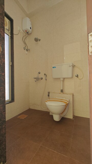 Bathroom in 2 BHK Apartment at Nisar Rajal Veer Abhimanyu CHS, Babhai Naka – for Sale