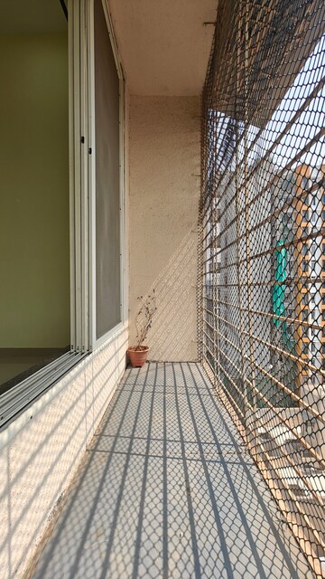 Balcony in 2 BHK Apartment at Nisar Rajal Veer Abhimanyu CHS, Babhai Naka – for Sale