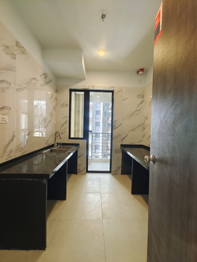 Kitchen, risland-the-icon 2 Bedroom 1085 Sq.Ft. Apartment In Dhokali Thane 8170475