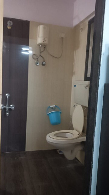 Bathroom in 3 BHK Apartment at Om Sai Charan CHS, Borivali West – for Sale