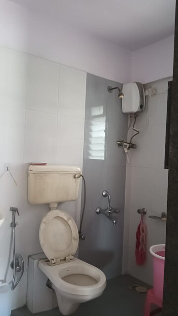 Bathroom in 3 BHK Apartment at Om Sai Charan CHS, Borivali West – for Sale