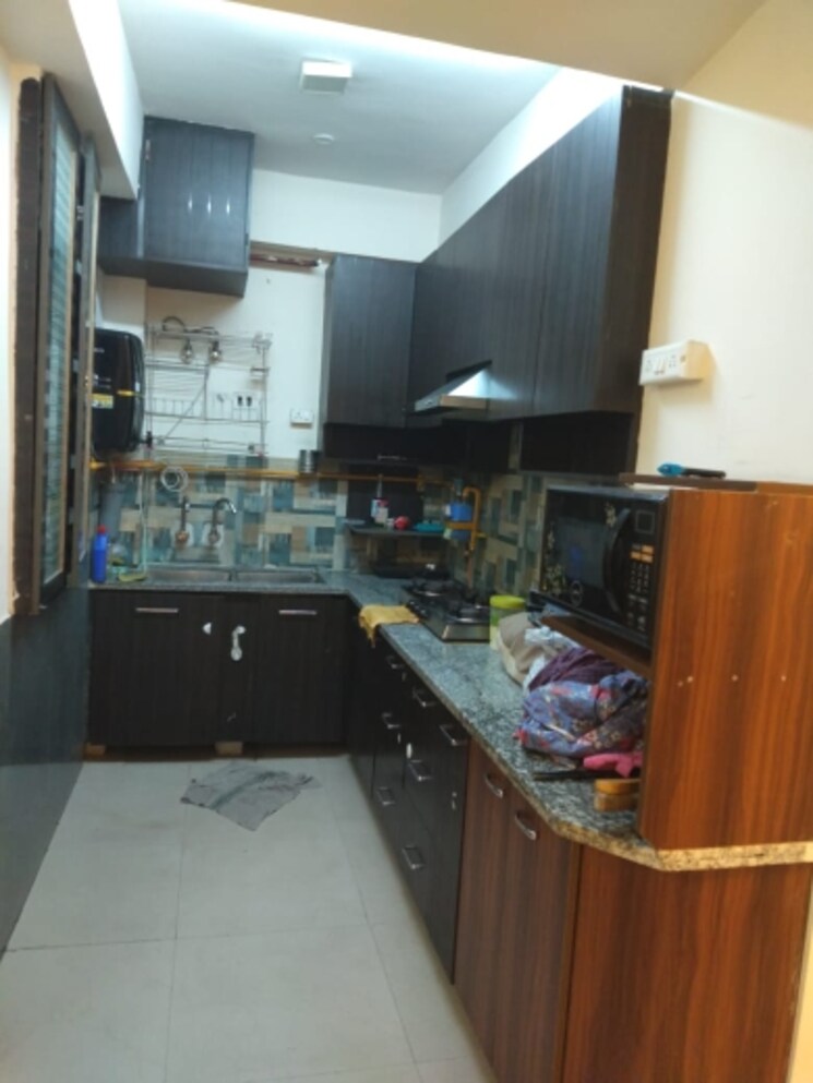 Kitchen, supertech-livingston 2 Bedroom 1000 Sq.Ft. Apartment In Sain Vihar Ghaziabad 8170523