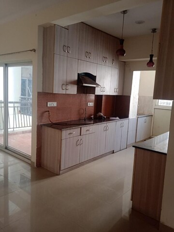 Kitchen in 3 BHK Apartment at Aims Golf City, Sector 75 – for Sale