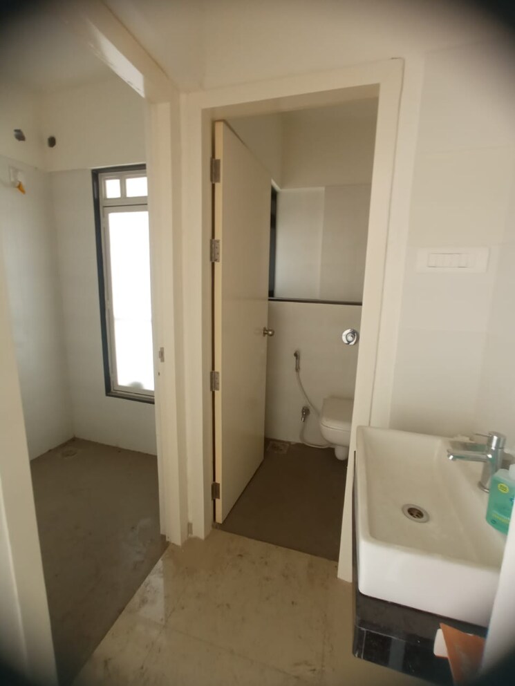 Bathroom, godrej-greens 2 Bedroom 750 Sq.Ft. Apartment In Undri Pune 8170607