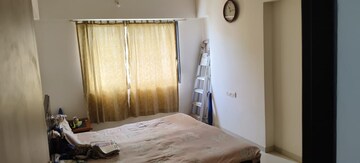 Bedroom in 2 BHK Apartment at Kanakia Rainforest, Andheri East – for Rent