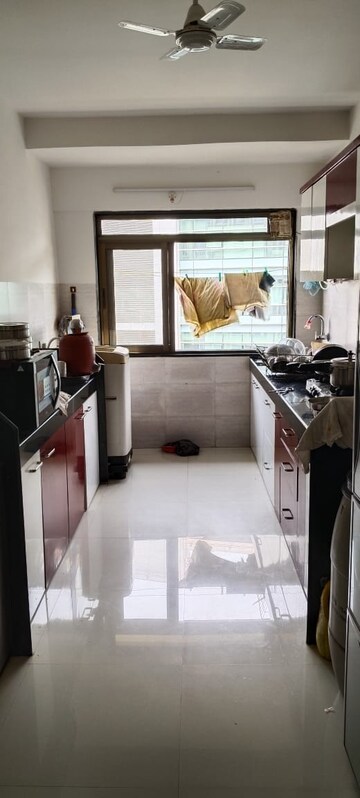 Kitchen in 2 BHK Apartment at Kanakia Rainforest, Andheri East – for Rent