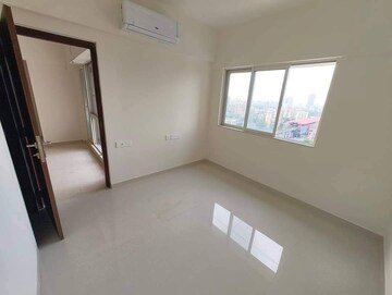 Room in 2 BHK Apartment at Omkar Signet, Malad East – for Rent