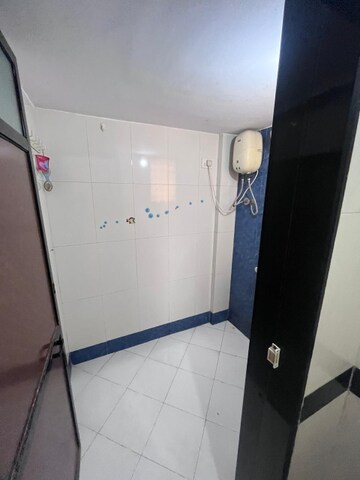 Bathroom in 1 BHK Apartment at Dharti CHS Tilak Nagar, Tilak Nagar – for Rent
