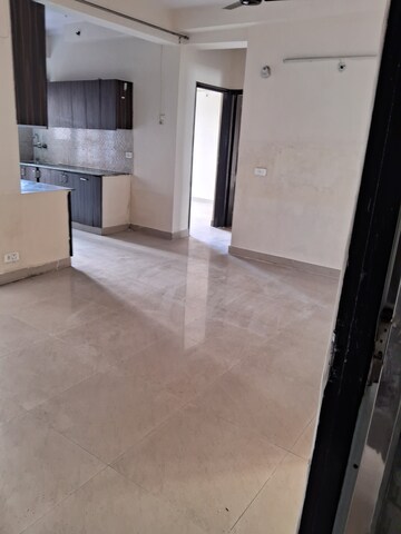 Kitchen in 2.5 BHK Apartment at Aims Golf City, Sector 75 – for Rent