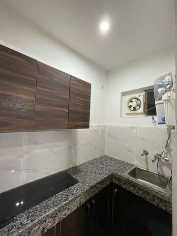Kitchen in 1.5 BHK Builder Floor at Sector 27 – for Rent