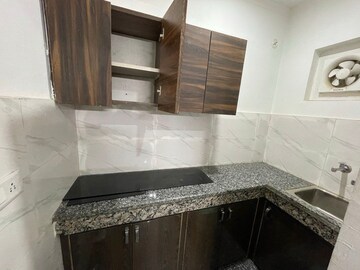 Kitchen in 1.5 BHK Builder Floor at Sector 27 – for Rent