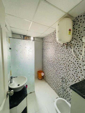 Bathroom in 2 BHK Apartment at Chandra Modern Panorama, Bagiamau – for Sale