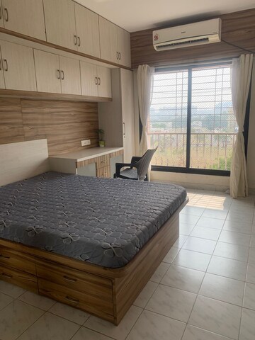 Bedroom in 2 BHK Apartment at Eden Garden CHS, Viman Nagar – for Rent