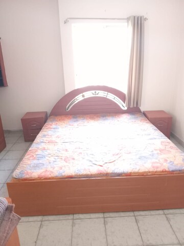 Bedroom in 2 BHK Apartment at Eden Garden CHS, Viman Nagar – for Rent
