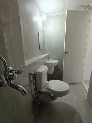 Bathroom in 2 BHK Apartment at Runwal Gardens, Dombivli East – for Rent
