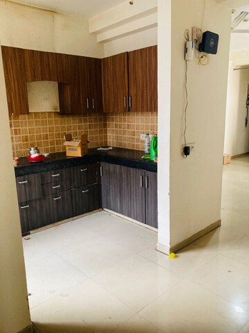 Kitchen in 3 BHK Apartment at Mahagun Mywoods II, Sector 16c Greater Noida – for Rent