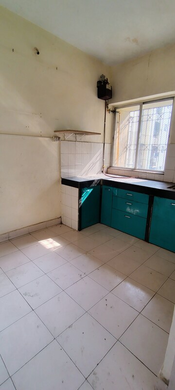 Kitchen in 2 BHK Apartment at Eden Rose Apartment, Mira Road – for Rent