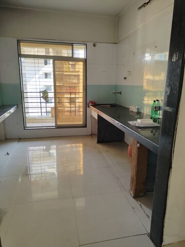 Kitchen in 2 BHK Apartment at Maitri Ocean, Kharghar – for Sale